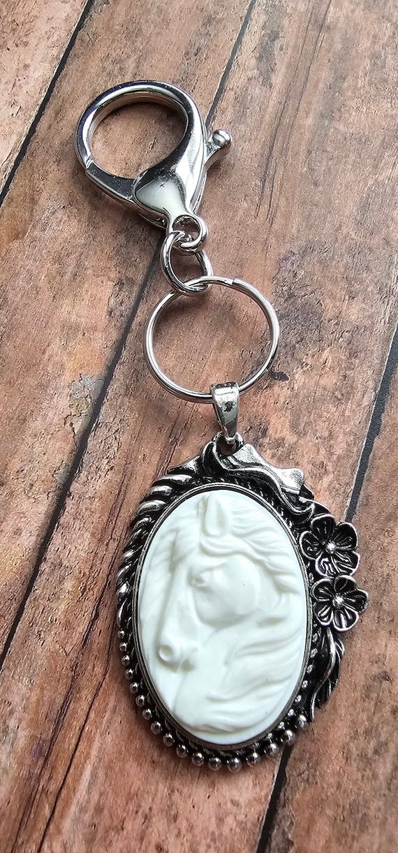 Silver metal and white equestrian bag charm/keychain