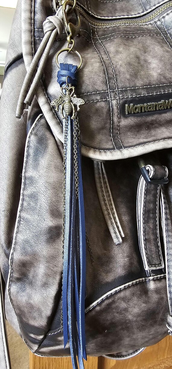 Bronze bee keychain/bag charm with blue leather