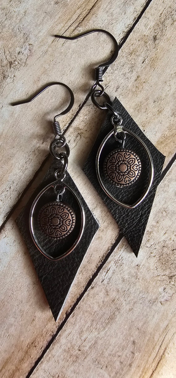 Metal and diamond shaped leather earrings