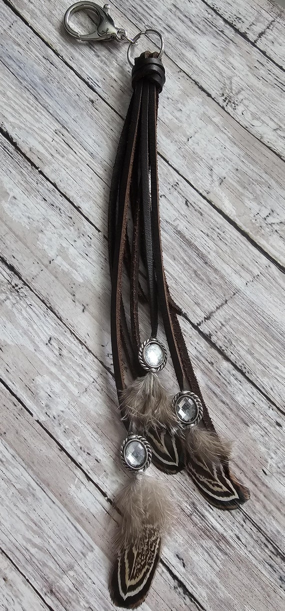 Brown leather and feather bag charm/keychain