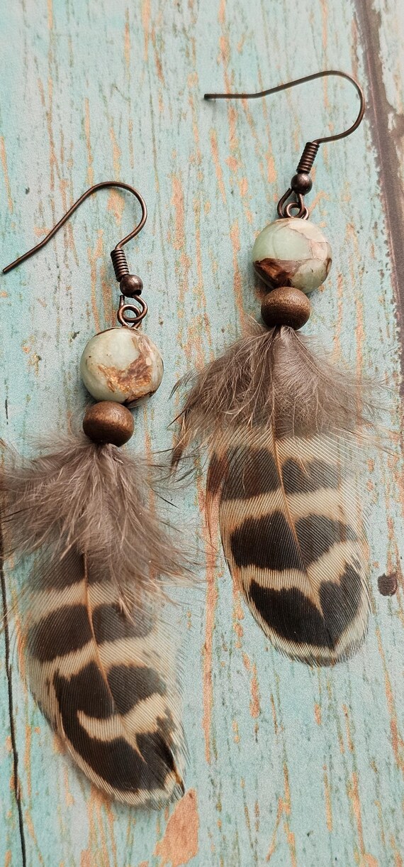 Feather earrings with wood and natural beading