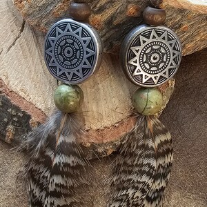 One of a kind feather earrings with beading