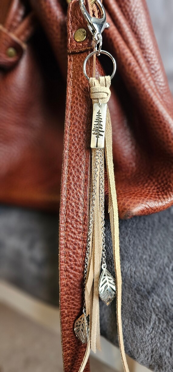 Light suede keychain with silver tree pendant and 3-D style leaf charms filled with clear beads