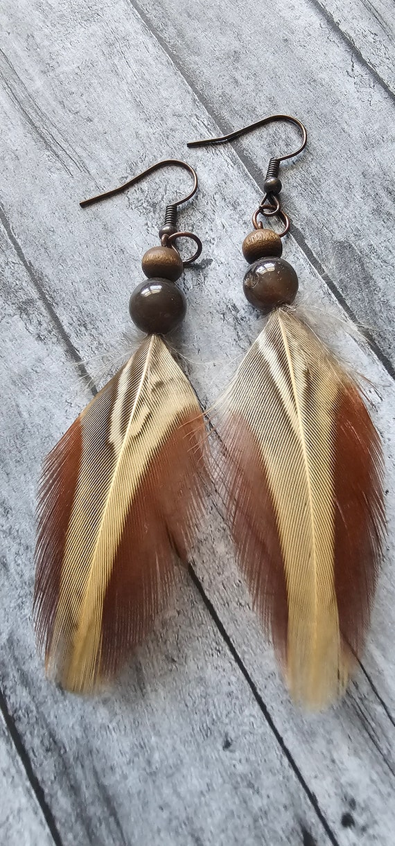 Red and brown pheasant feather earrings with beading