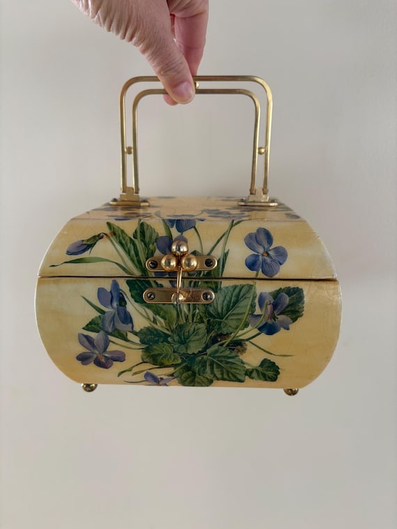 Beautiful vintage top handle yellow purse with violets on it from the 1960s featuring gold hardware Johnny jump ups Easter purse