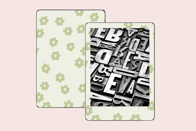 May include: A black and white image of a Kindle e-reader with a floral pattern on the front and back. The screen displays a close-up of a jumbled collection of metal letterpress type.