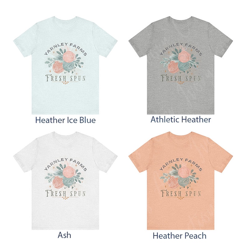 May include: Four different color t-shirts with a graphic design of yarn balls and leaves with the text "Yarnley Farms Fresh Spun". The colors are Heather Ice Blue, Athletic Heather, Ash, and Heather Peach.