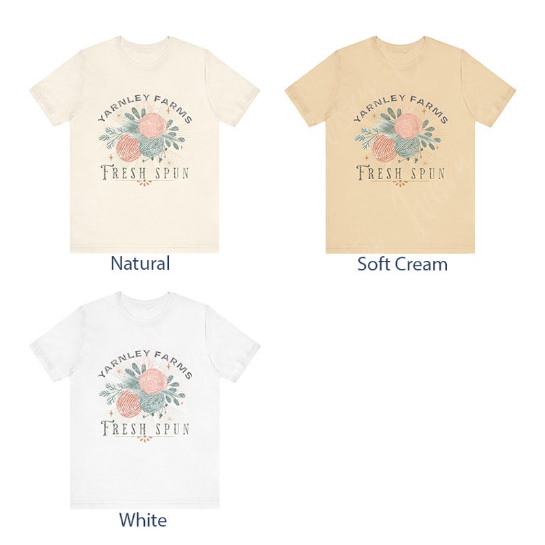 May include: Three t-shirts in different colors: natural, soft cream, and white. Each shirt features a graphic design of a floral arrangement with the text "YARNLEY FARMS FRESH SPUN".