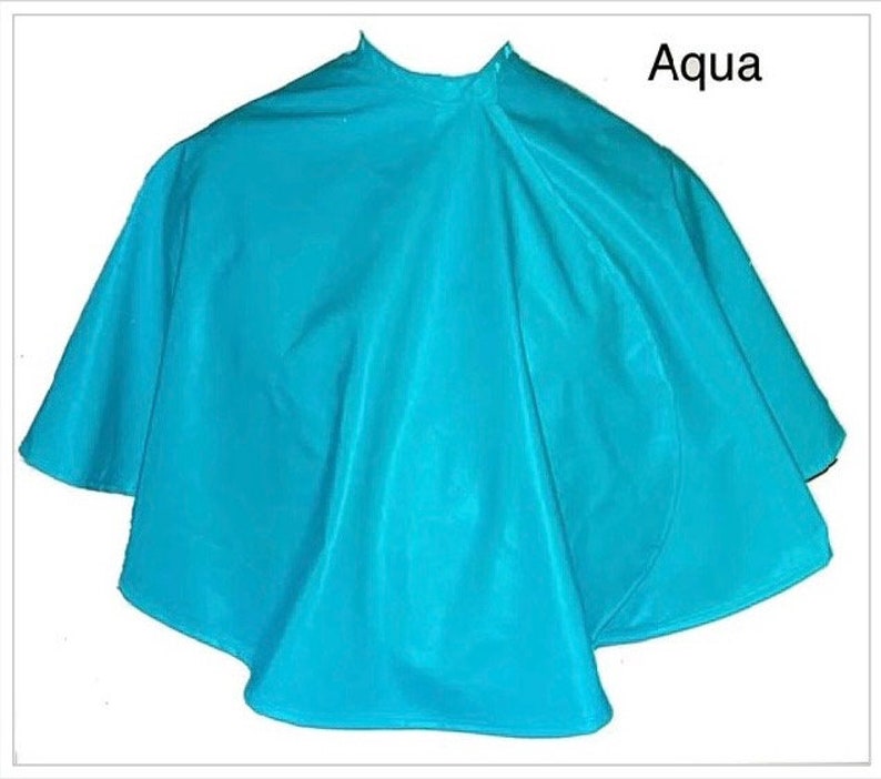 RecoverEasy , surgeon approved, after surgery shower cape includes 2 drain holders. Great for after mastectomy or any upper body surgery. Aqua