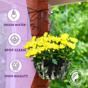 May include: A hanging flower basket filled with bright yellow chrysanthemums. The basket has a black and white leaf pattern and a black bow. The image includes text that says "Drain Water", "Spot Clean", and "High Quality".
