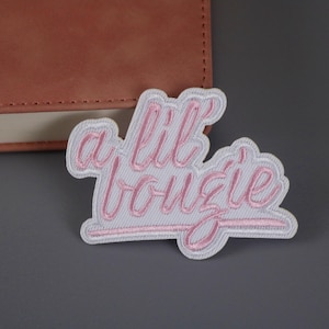 a lil bougie patch, phrase, pink, iron on patch, embroidered patch, applique, patch for jacket, patch for backpack