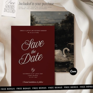 May include: A deep burgundy save the date card featuring white cursive text that reads Save the Date, Emilia & Jovan are getting married, and the date Saturday the 12th of July 2027 in Lyon, France. A second card shows a swan on a dark lake.