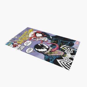 May include: A comic book cover featuring a purple background with a black and white image of Venom, a symbiote alien, biting the head of Spider-Man. The cover text reads "Amazing Spider-Man" and "I killed him well."