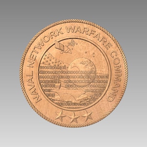 May include: A copper-colored round coin with the words "NAVAL NETWORK WARFARE COMMAND" around the edge. The center of the coin features a stylized image of a satellite, a globe, and a digital code.