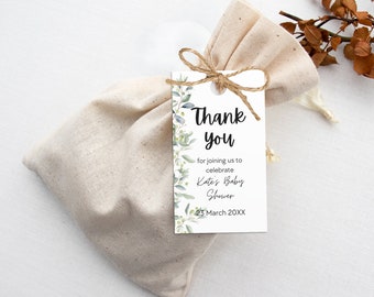 May include: A white thank you tag with green foliage and the text "Thank you for joining us to celebrate Kate's Baby Shower 25 March 20XX".