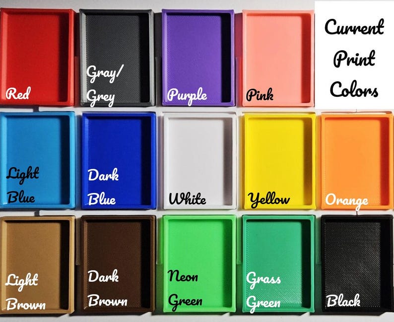 May include: A collection of small, rectangular trays in various colors, including red, gray, purple, pink, light blue, dark blue, white, yellow, orange, light brown, dark brown, neon green, grass green, and black. The text "Current Print Colors" is also present.