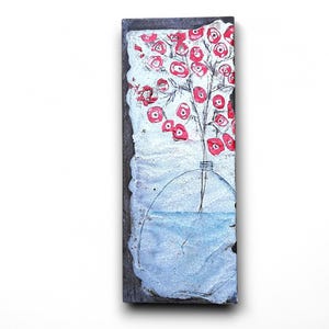 May include: A hand-painted ceramic tile with a white background and a red flower arrangement in a clear vase. The vase is outlined in black and the flowers are painted in a loose, abstract style.