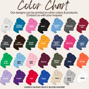 May include: Color chart showcasing a variety of unisex Gildan Heavy Blend hoodies in various colors, including Ash, Antique Sapphire, Azalea, and Black. The chart also includes colors like Carolina Blue, Charcoal, and Cardinal Red. The text "Color Chart" is at the top.