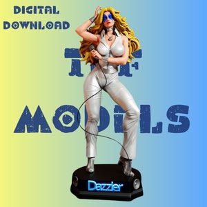 May include: A white figurine of a woman with long blonde hair, wearing a white jumpsuit and holding a microphone. The figurine is standing on a black base with the word "Dazzler" printed on it. The background is a gradient of yellow and blue.