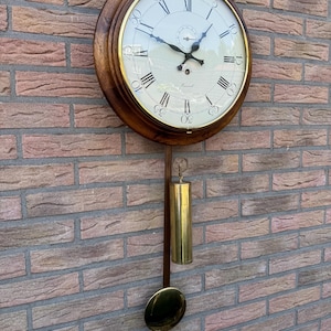 Vintage school clock / pub clock with pendulum and second hand.