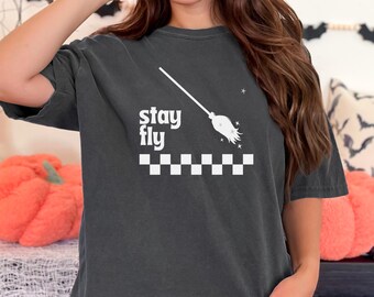 Halloween Comfort Colors T-Shirt with Stay Fly and a Witches Broom for Spooky Season, Halloween Parties, and Gifts, Wizarding World Fans