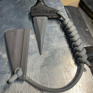 Tactikey With Grey G10 Nonmetallic Blade, kydex sheath and lanyard.