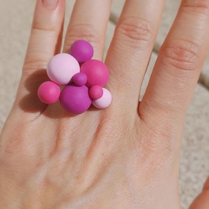 Handcrafted, adjustable clay and steel ring for special occasions. Unique, bold, and edgy. A perfect gift for mom, sister, best friend, or girlfriend.