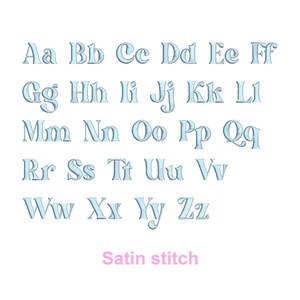 May include: A light blue alphabet in a satin stitch font. The letters are arranged in rows, starting with Aa and ending with Zz. The text "Satin stitch" is written in pink below the alphabet.