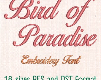 May include: An embroidery font design featuring the words "Bird of Paradise" in a script font. The text "Embroidery Font" is below. The image also includes the text "18 sizes PES and DST format". The text is in shades of pink, orange, and green.