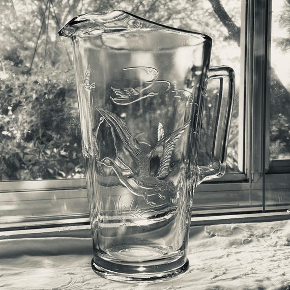 Jeannette Glass Pitcher • Flying Birds Mallard Duck Pattern • Clear Vintage Pressed Glass • Cottagecore Cabin Decor • Ice Lip Jug 1950s