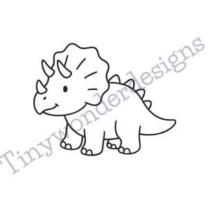 May include: A black and white line drawing of a Triceratops dinosaur. The dinosaur has three horns, a frill, and a smiling face. The text "Tinywonderdesigns" is below the dinosaur.