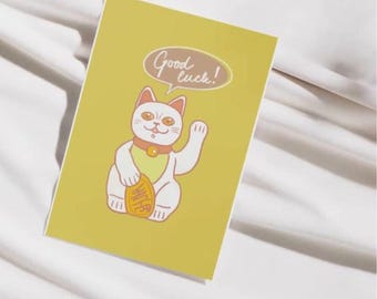 Tarjeta de felicitación con el gato de la suerte Maneki meko, verde y blanco, arte digital colorido