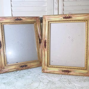 May include: A white ceramic mug with a black handle and the text "But First, Coffee" in a black, bold font. The mug is on a white surface.