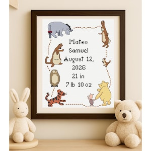 May include: Framed cross-stitch artwork with cartoon animals and the name Mateo Samuel, birth date August 12, 2026, 53 cm in length, and 3.46 kg. The artwork is in a dark brown frame.