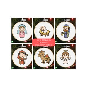 May include: A set of 14 Nativity Ornaments Cross Stitch Patterns featuring six circular embroidery hoops with pixel art designs of Mary, baby Jesus in a manger, Joseph, a shepherd, a camel, and an angel, all displayed on a dark background.