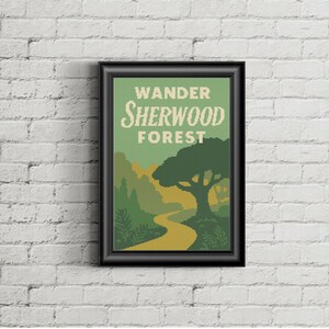 May include: A framed art print featuring a vintage travel poster design for Sherwood Forest. The poster has a green and yellow color scheme with the words "Wander Sherwood Forest" at the top. A winding path leads through a forest.