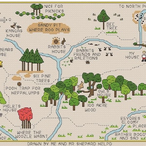 May include: A cross-stitch map of the Hundred Acre Wood, featuring locations like Rabbit's House, Owl's House, and Piglet's House. The map includes text labels and illustrations of trees, rivers, and characters. The text at the bottom reads "DRAWN BY ME AND MR SHEPARD HELPD."
