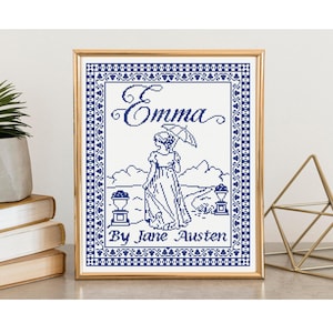 May include: A framed cross-stitch embroidery featuring a dark blue design on a white background. The artwork depicts a person holding an umbrella, with the text "Emma" at the top and "By Jane Austen" at the bottom, enclosed in a decorative border.
