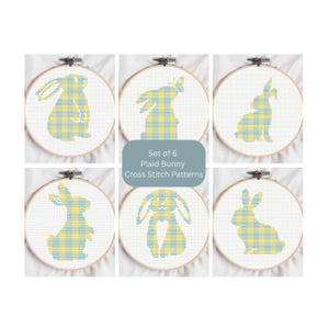 May include: Six cross-stitch patterns featuring bunny designs in a yellow and blue plaid pattern, each mounted in a wooden embroidery hoop. The text "Set of 6 Plaid Bunny Cross Stitch Patterns" is displayed on a blue-gray rectangle.
