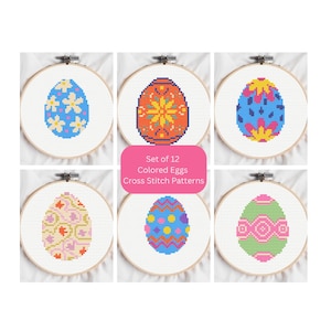 May include: Set of 12 cross stitch patterns featuring colorful Easter egg designs. Each egg is displayed in a wooden embroidery hoop. The eggs have various patterns and colors, including blue, orange, pink, and green.