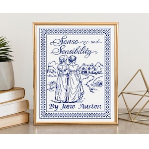 May include: A framed cross-stitch artwork featuring the title "Sense and Sensibility" and the author's name, Jane Austen. The artwork depicts two women in dresses walking on a path, with a house and trees in the background. The frame is gold.