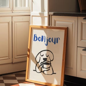 Bonjour coffee poster featuring a hand-drawn dog sipping coffee, perfect for kitchens or cafes.