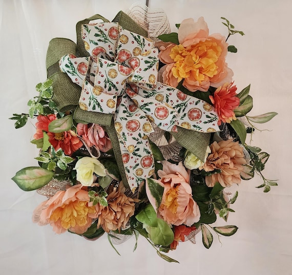 peach and pink colored wreath that's perfect all year long