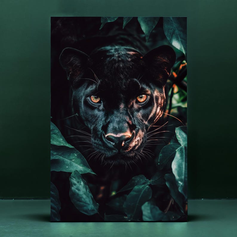 May include: A canvas print featuring a black panther's face, framed by lush green foliage. The panther's intense yellow eyes and dark fur create a striking contrast. The artwork evokes a sense of the wild and natural world.