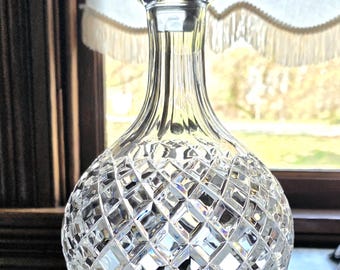 Vintage Crystal Hogget Decanter on wood stand.