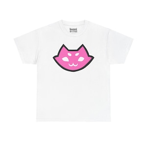 May include: White t-shirt featuring a pink cat face design with black outlines. The cat face has three small dots on each side and a curved mouth. The text "bunni BYTEZ" is printed on the collar.