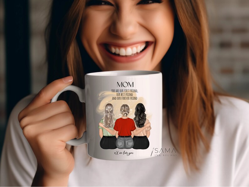 May include: White ceramic mug with a black handle. The mug has a graphic of three women with long hair, wearing different outfits. The text on the mug reads "MOM You are our first friend, our best friend and our forever friend. We love you."