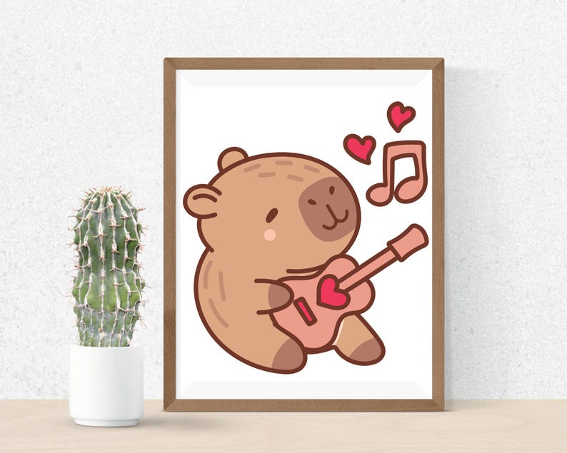 May include: A framed print featuring a cartoon bear playing a pink guitar with a heart-shaped sound hole. Two red hearts and a musical note are above the bear. The bear is light brown with a darker brown outline.