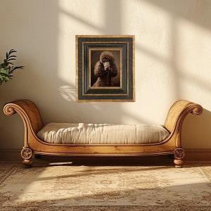 Product image of A framed portrait of a brown poodle with a black frame and gold accents. The frame is hanging on a white wall above a wooden bench with a beige cushion.