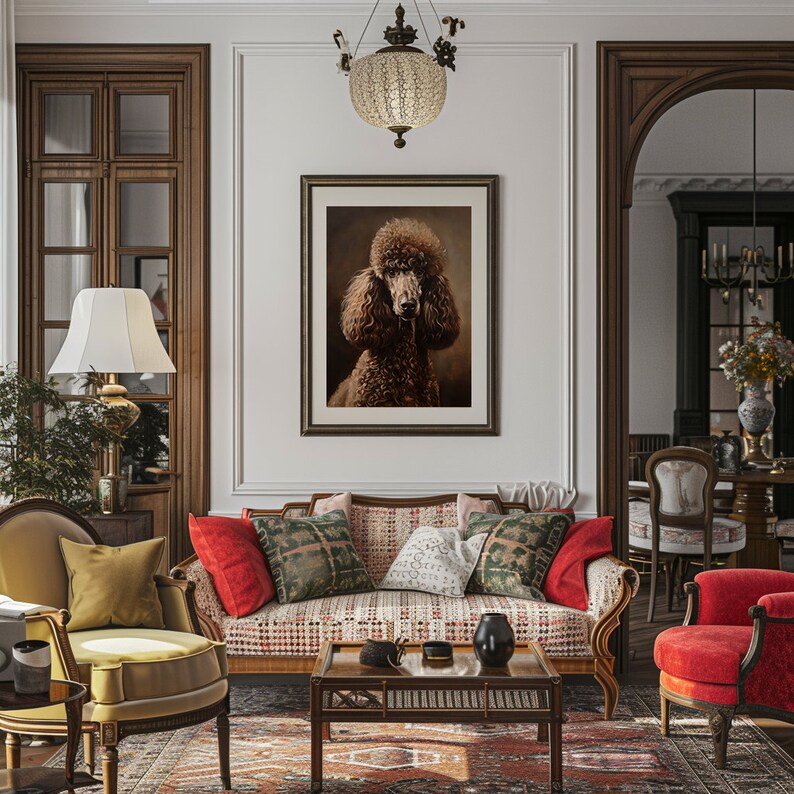 Product image of A living room interior with a brown poodle in a framed picture above a patterned sofa with red and green throw pillows. A coffee table with a vase and a book sits in front of the sofa. A lamp with a white shade sits on a side table next to a brown armchair.